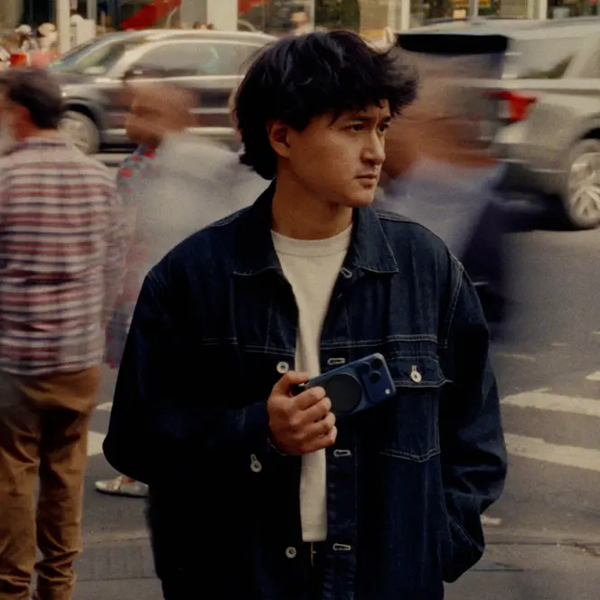 Faizal Westcott with the iphone on the street