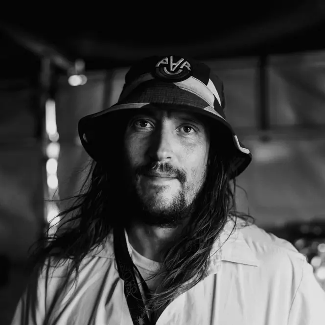 A person is standing in front of the camera