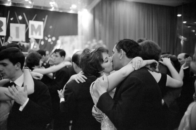 A couple kissing at a Purim Party