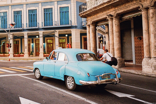 Blue car on a street