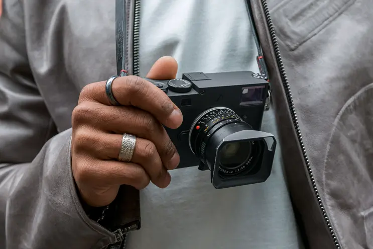 Leica M in hands of a man