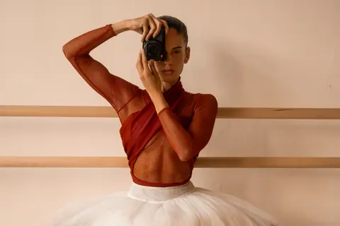 Kylie shea with a leica camera