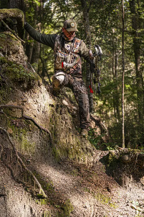 Hunter in the rain forest of New Zealand