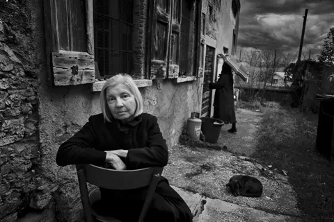 Black and white portrait of an old woman