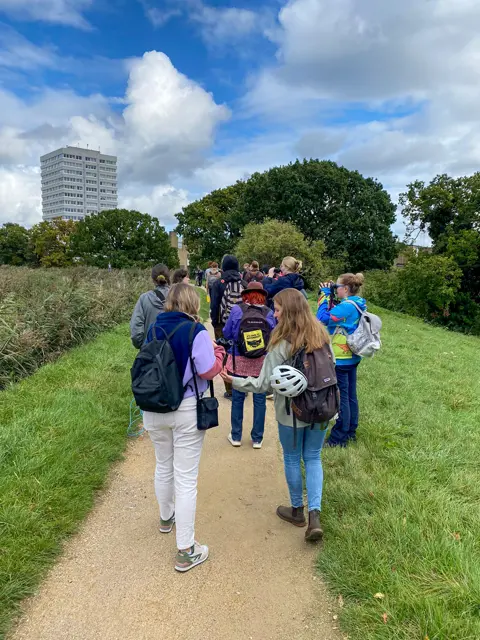 Group of birders walking in the park