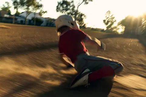 A boy playing baseball