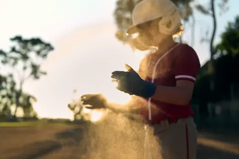 A boy playing baseball