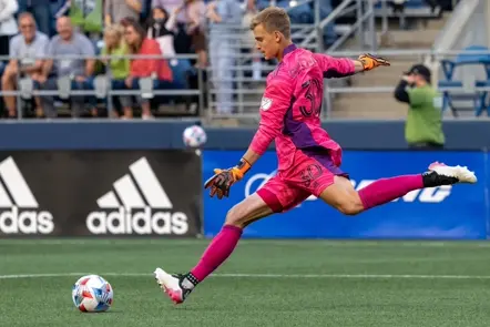 kicking the ball and jumping