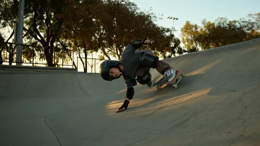 Boy on his skateboard in the skate pool