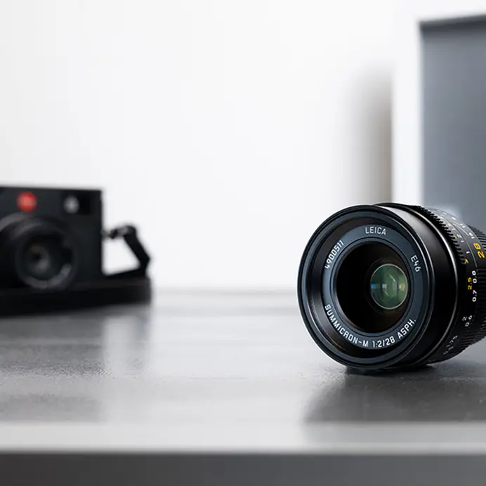 Leica M camera and M lens on a desk