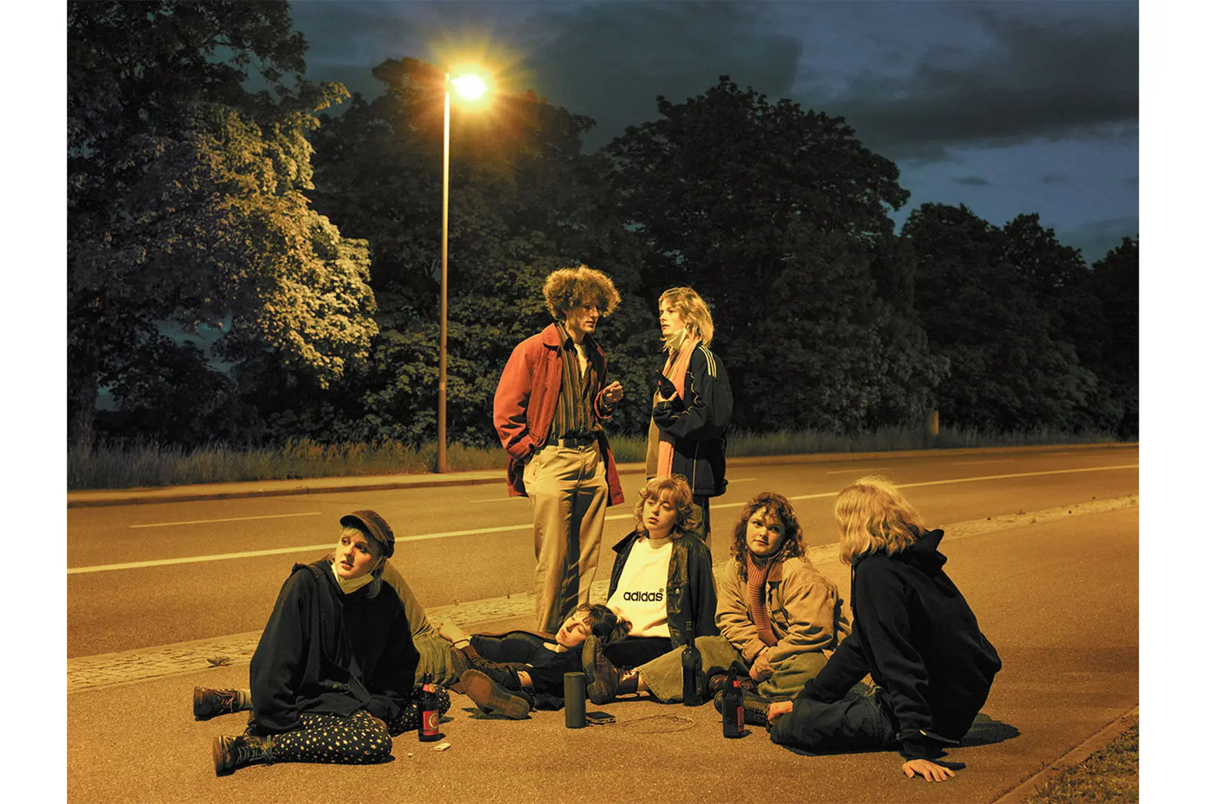 Friends sitting outdoor on the floor