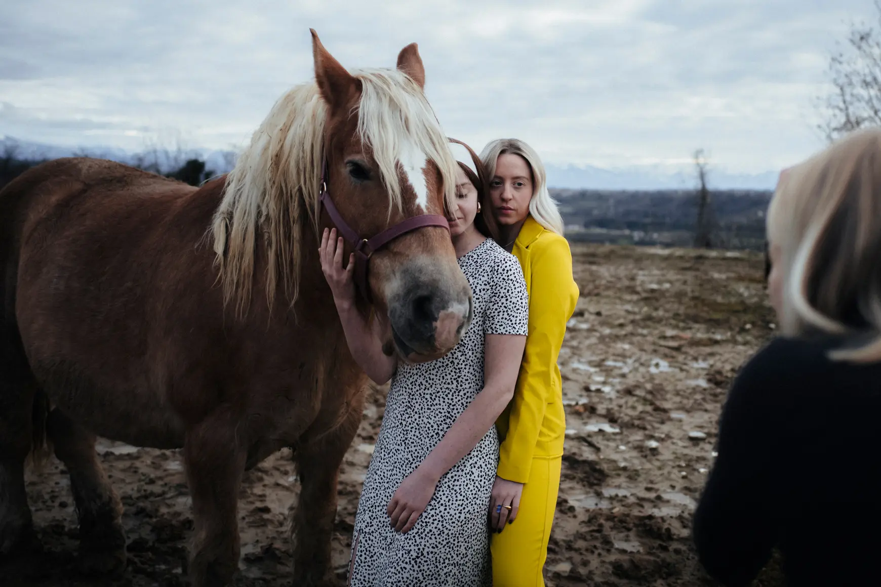 Two women with a horse
