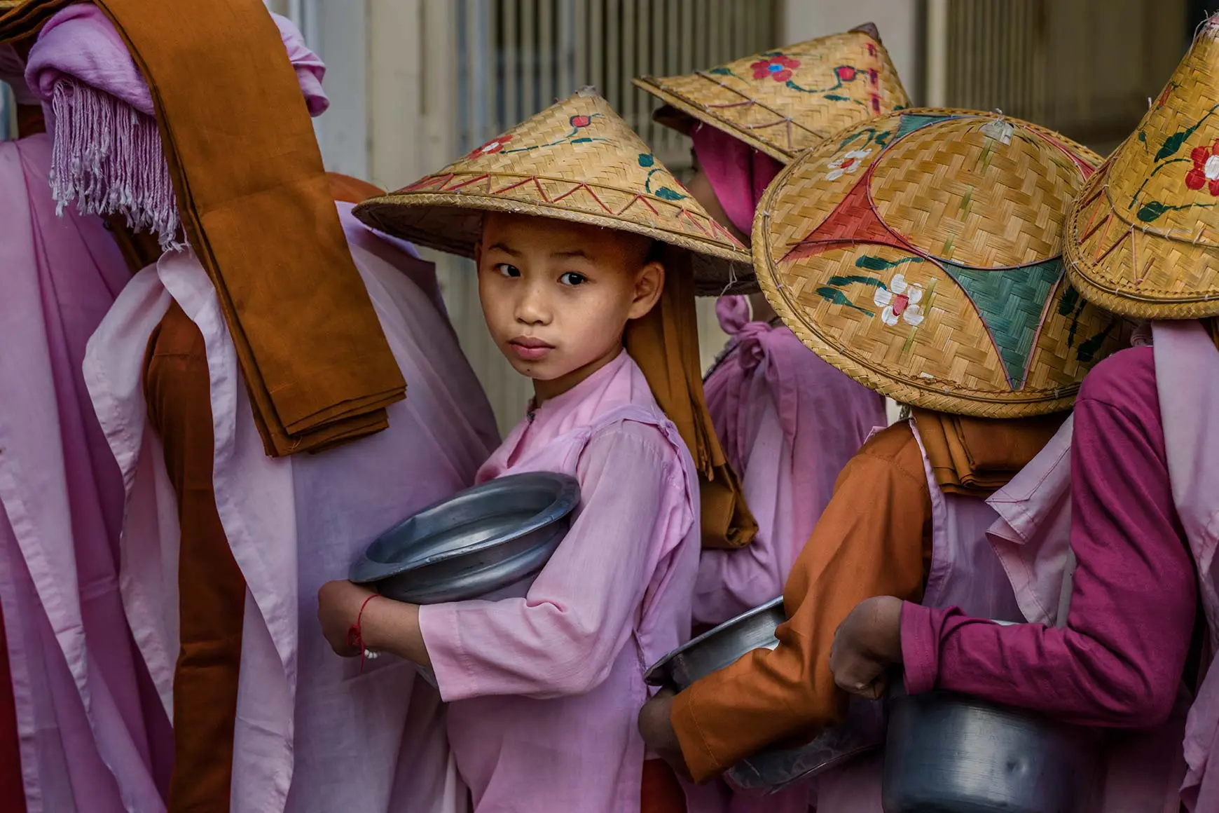 Child with pot in hands