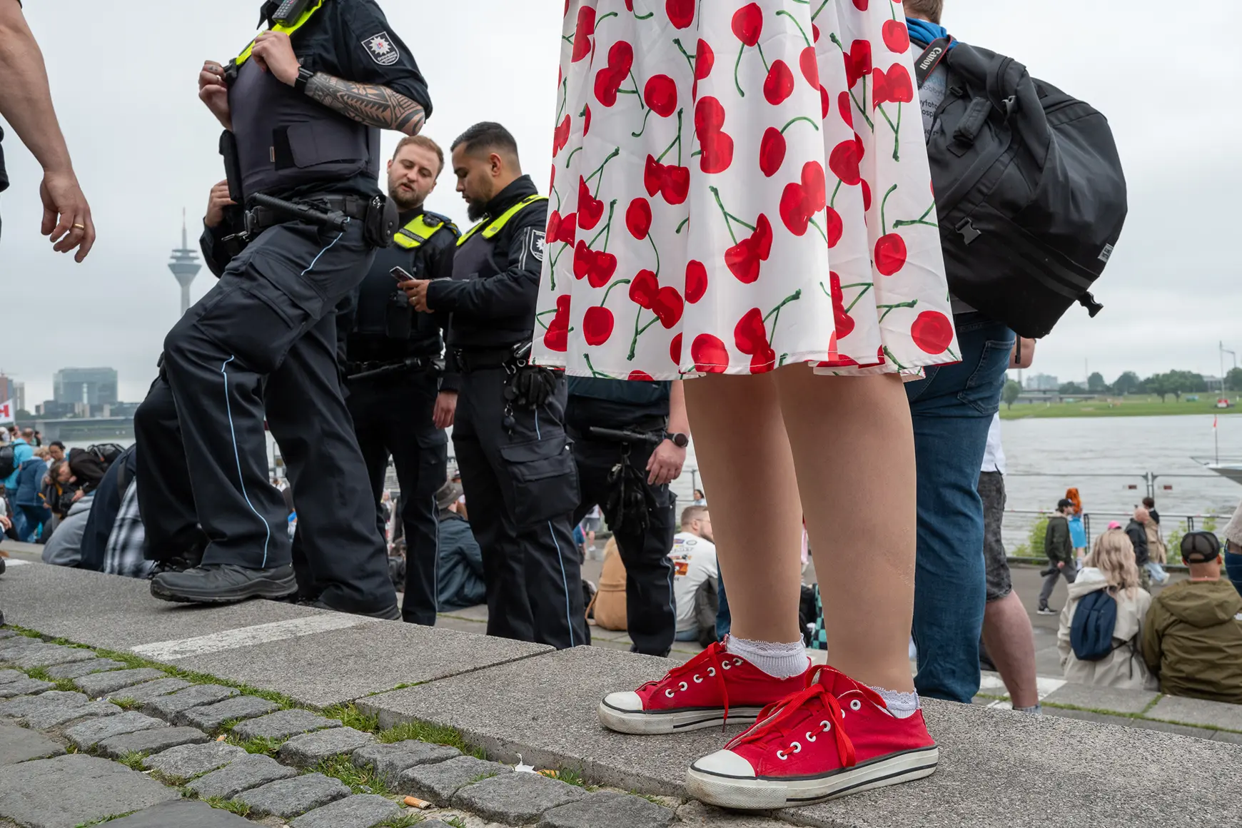 Woman in a dress with cherrys on it