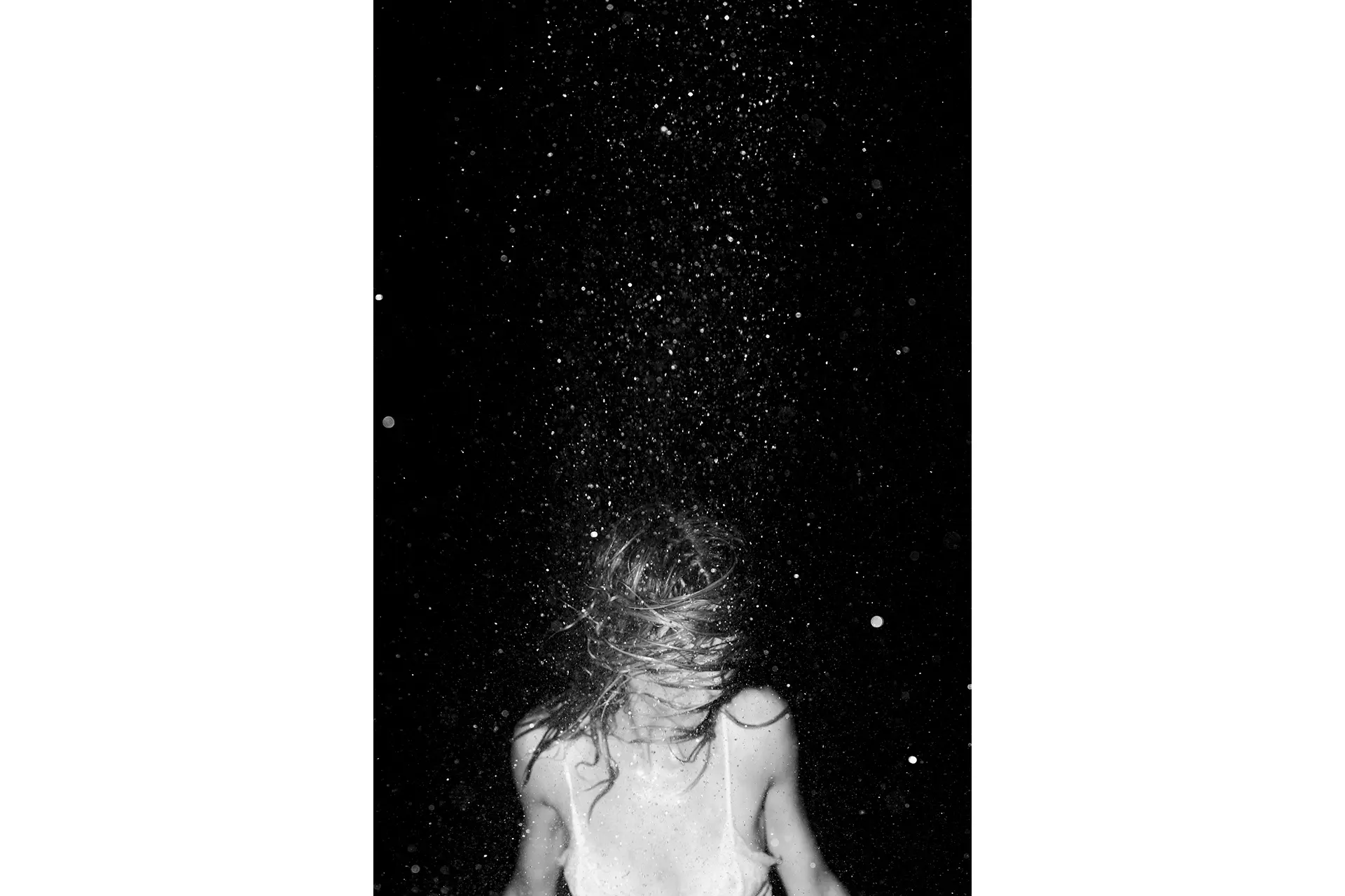 A dancer in the dark taken by Alwin Maigler