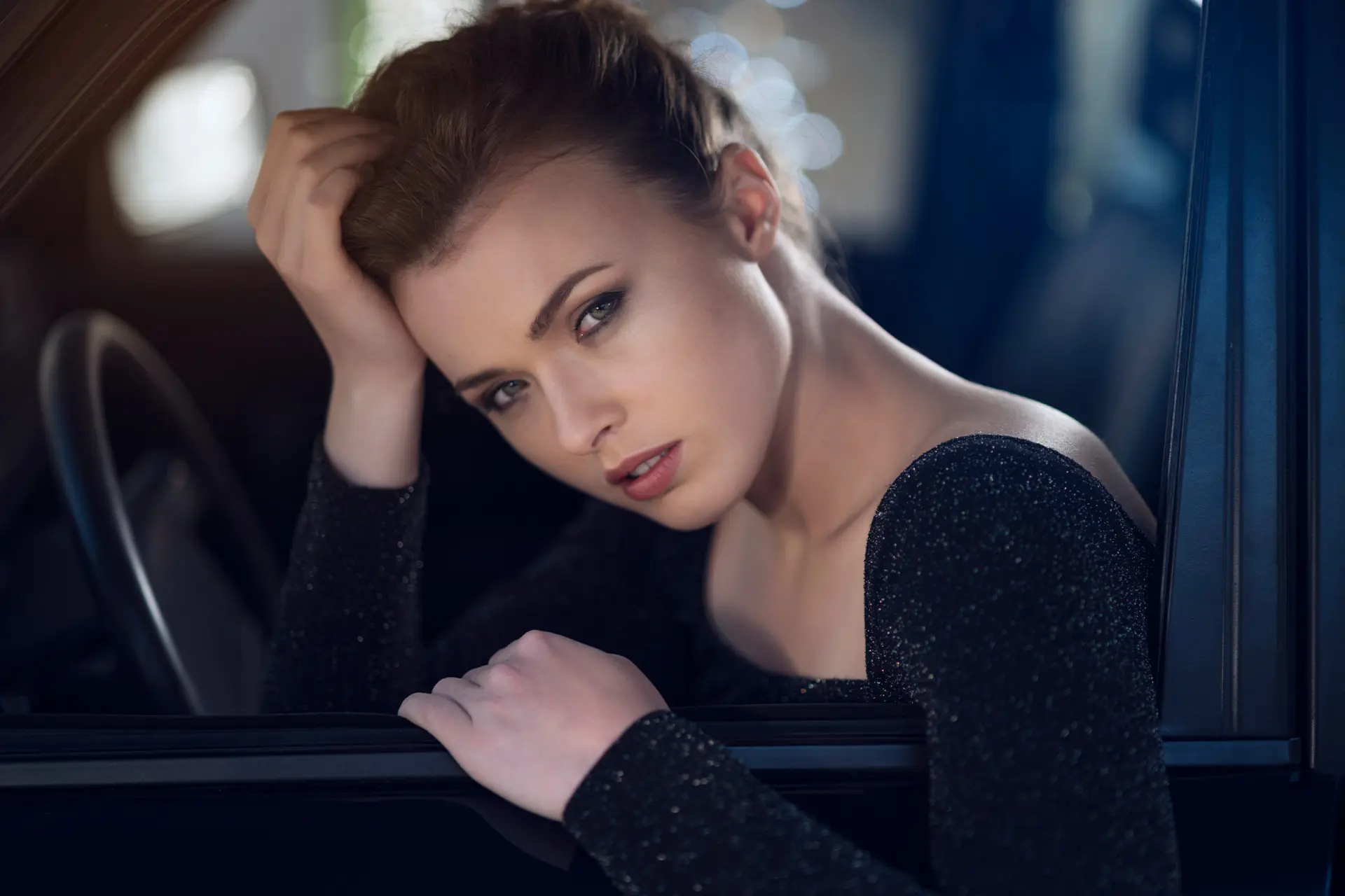 Woman sitting in a car