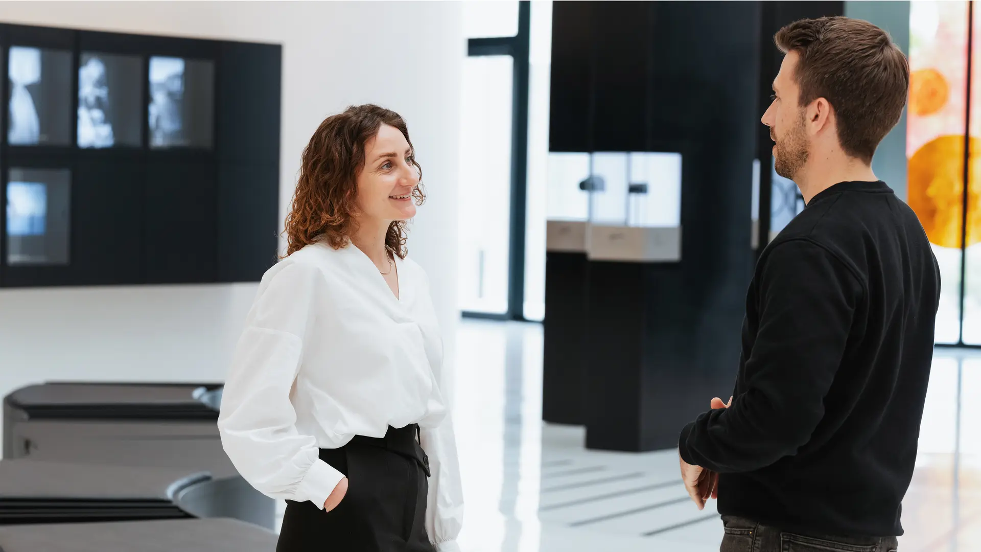 Two Leica employees
