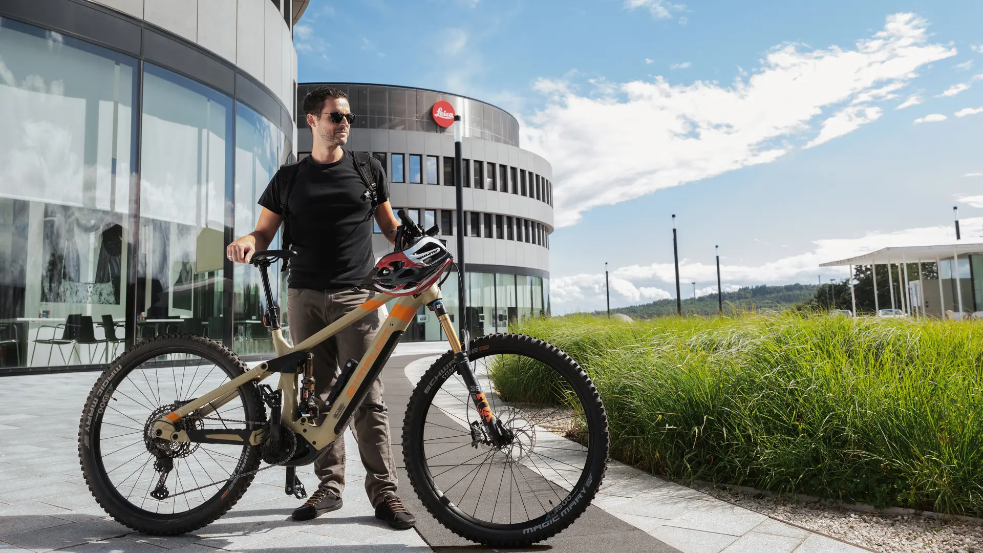Leica Employee with his Jobbike
