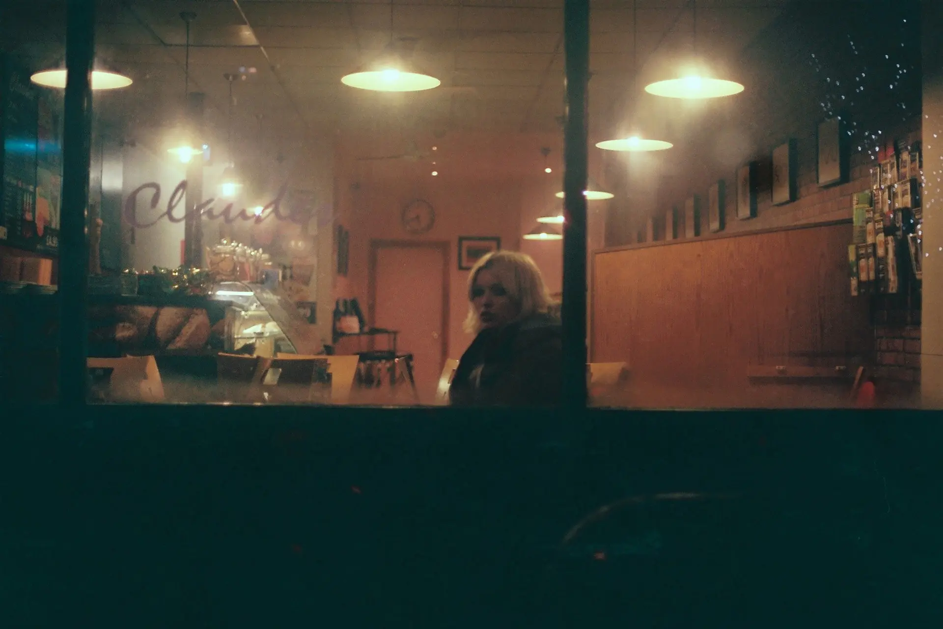 Woman sitting in a coffee shop