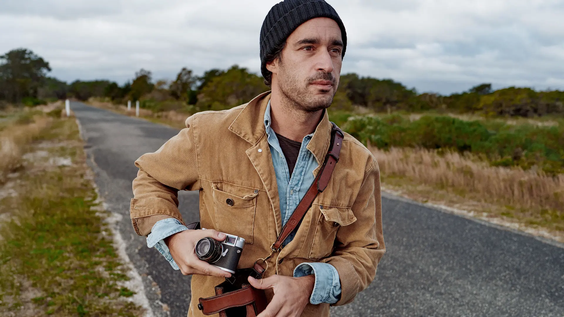 Man in Landscape with M11 in his right hand