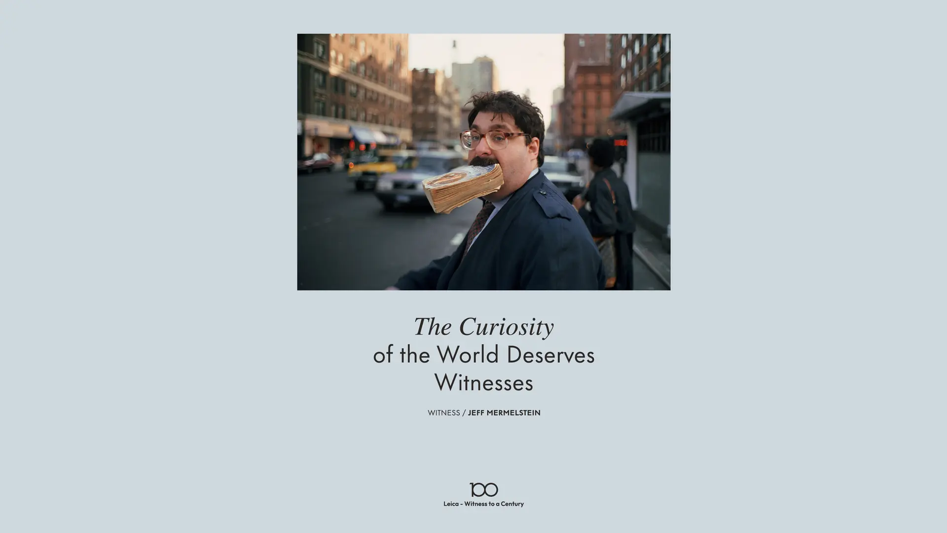 Men with a book in his mouth