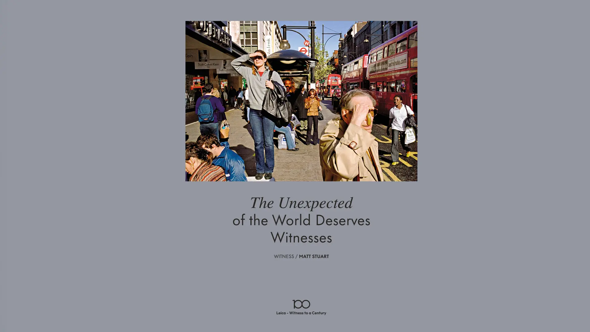 A woman who was standing on a bench, appearing to be looking for something and other people