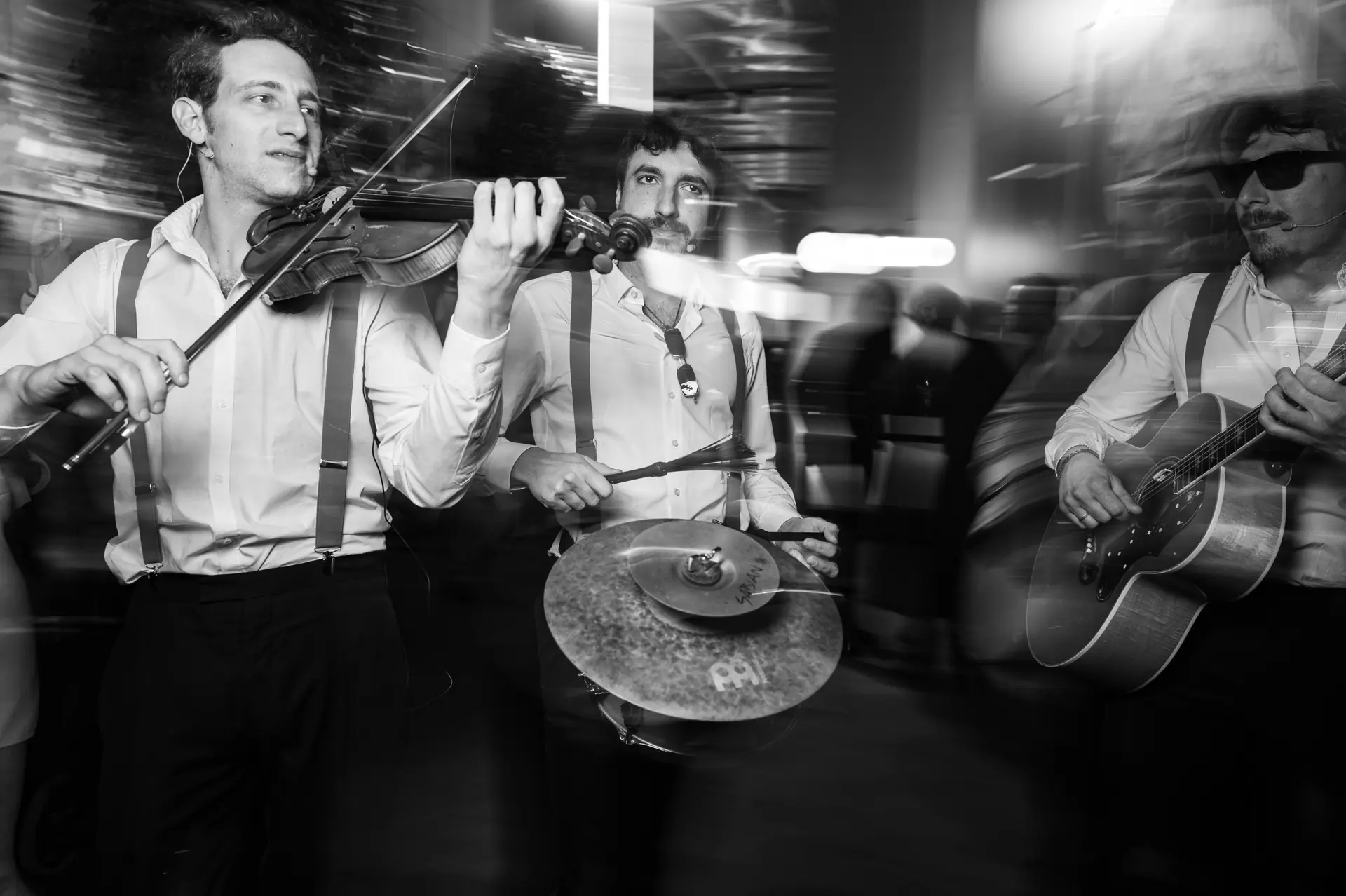 Street musician band plays at century event in Milan