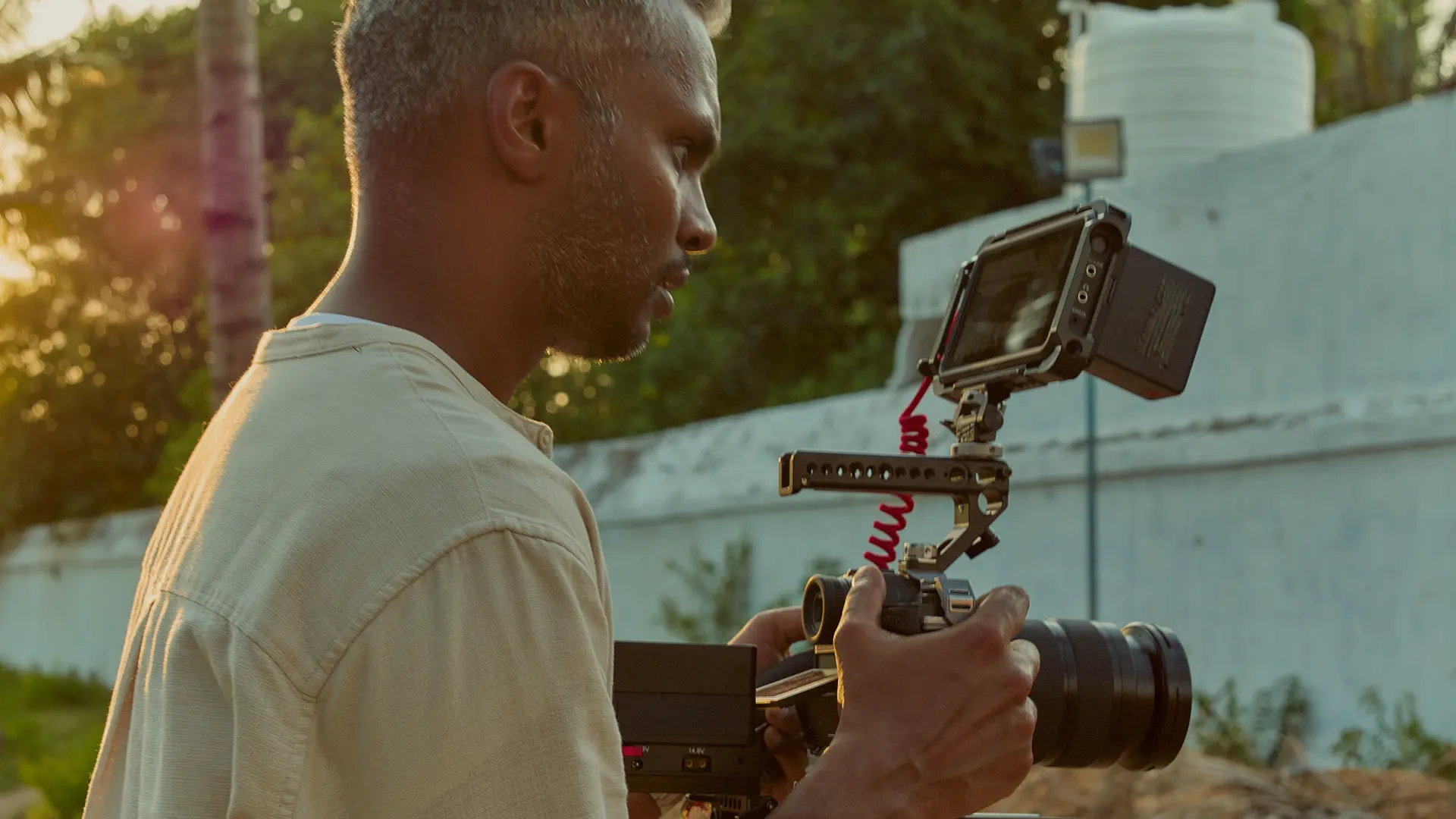 Photographer with Leica SL3-S.