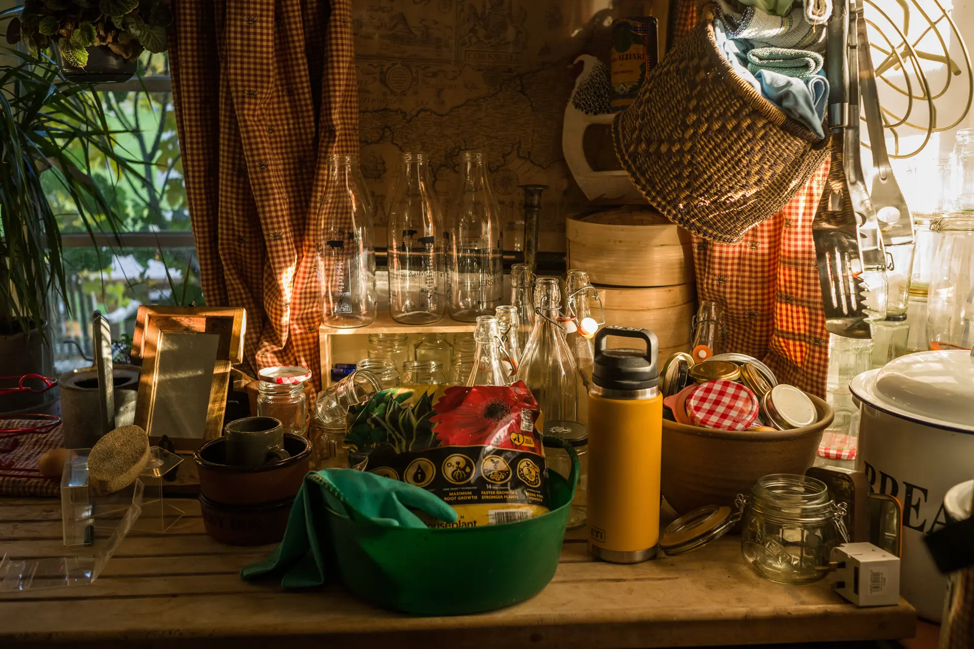 Empty preserving jars in a kitchen