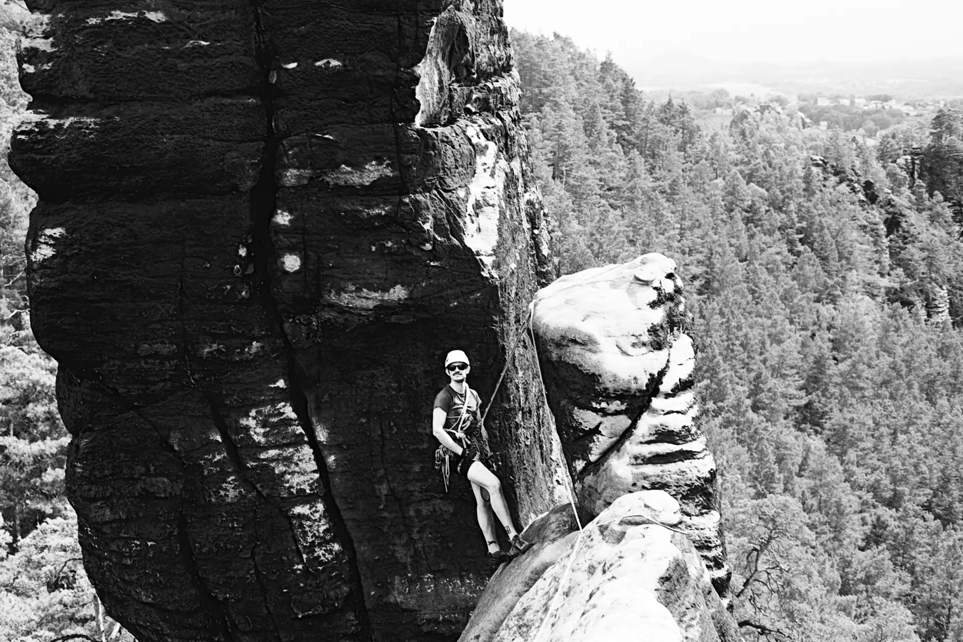 A man in the mountains enjoys the view.