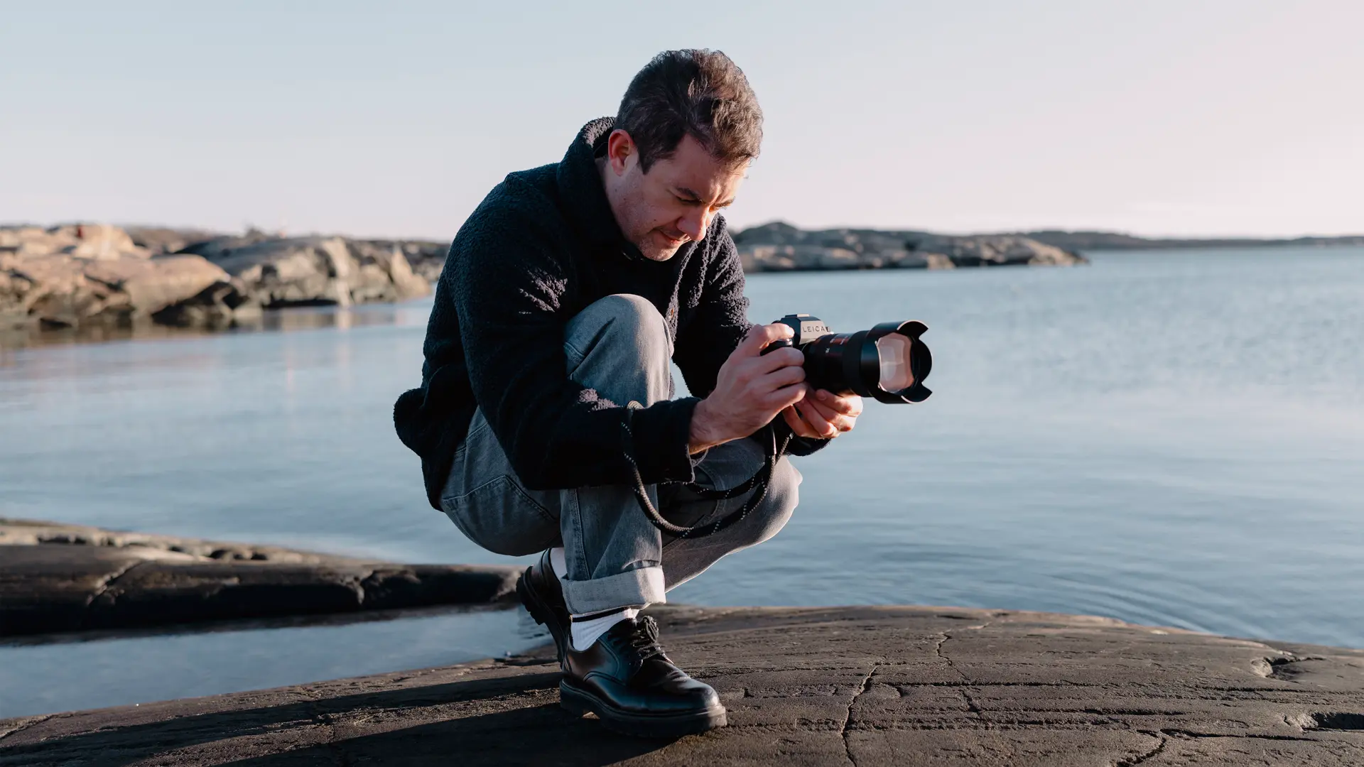 A person is taking photos with the Leica SL3-S