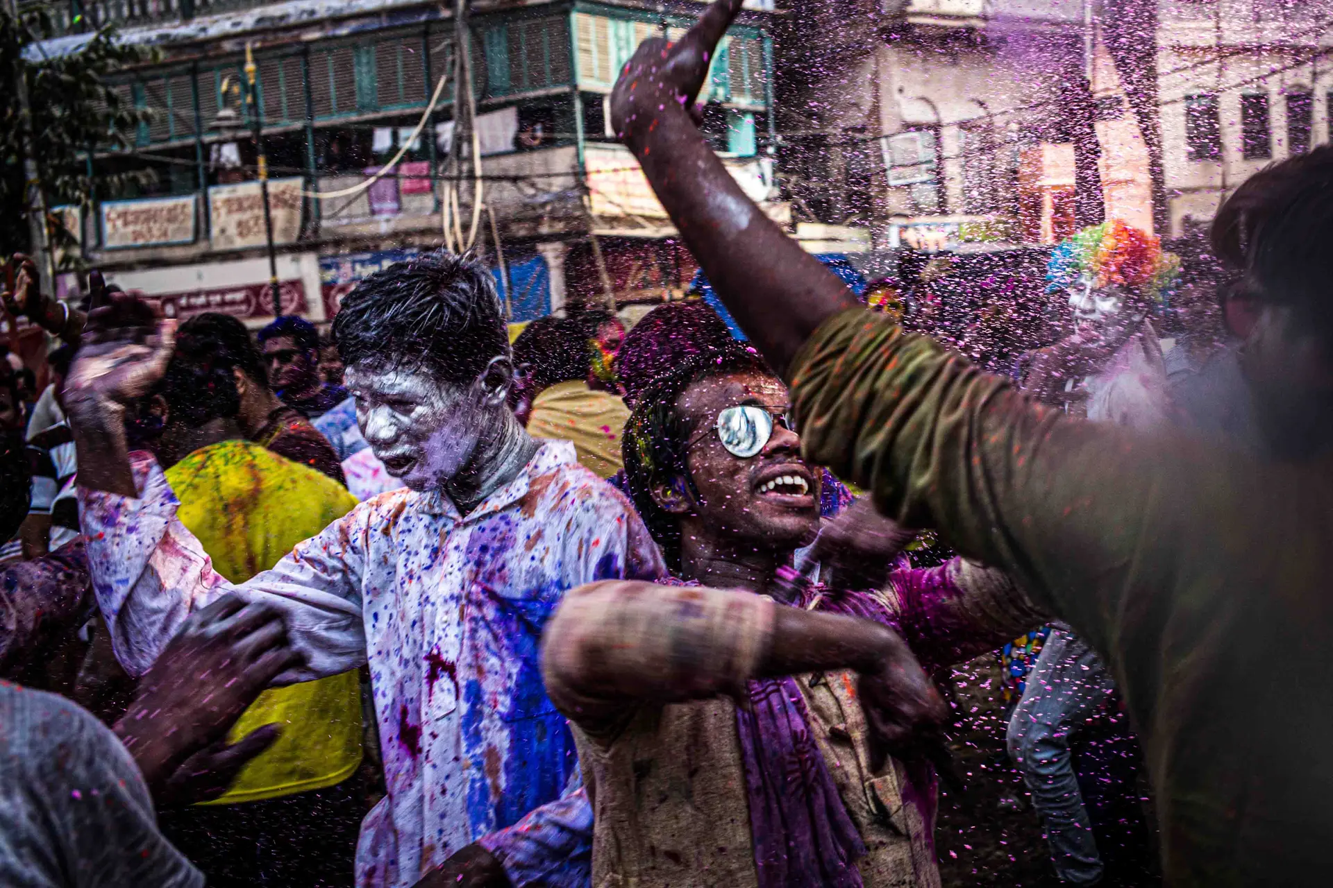People celebrating at the colour festival