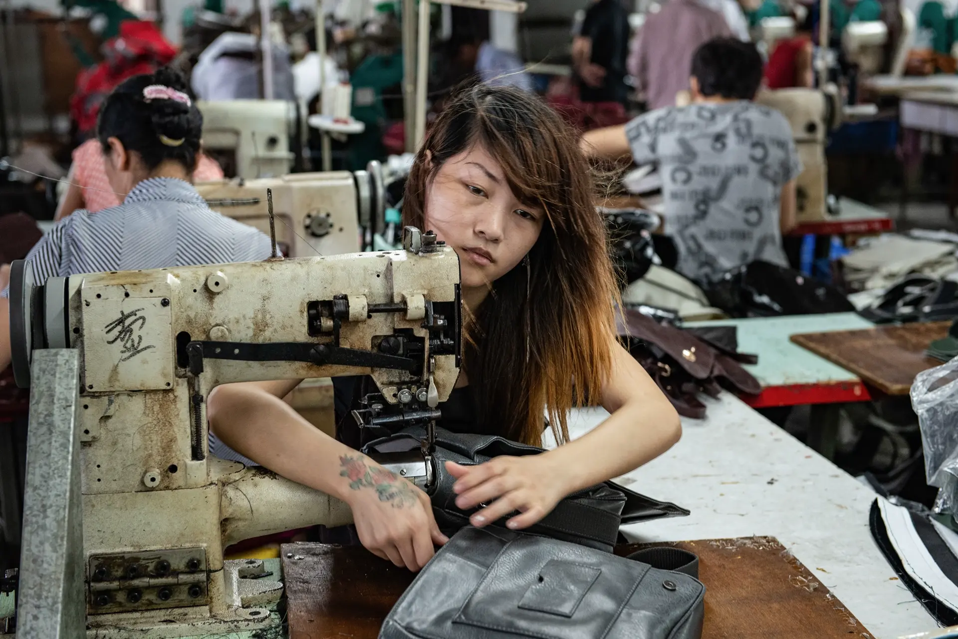 People working in a bag factory.