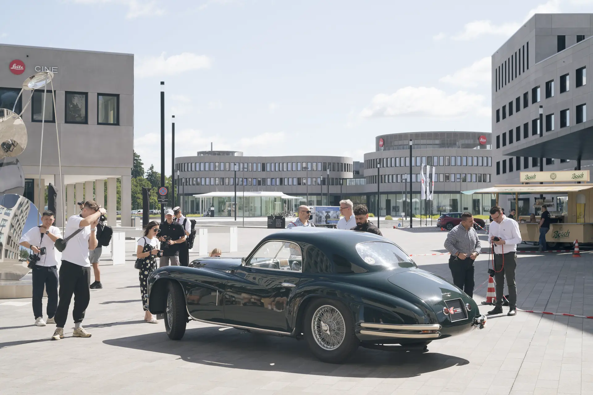 Leica Century Celebration Wetzlar workshop participants photograph a vintage car on the Leitz Park grounds