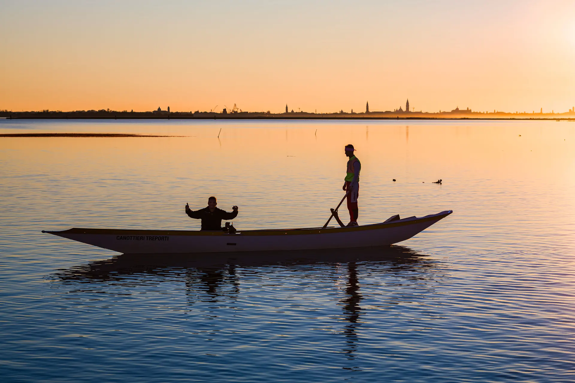 a boat with people in a body of water