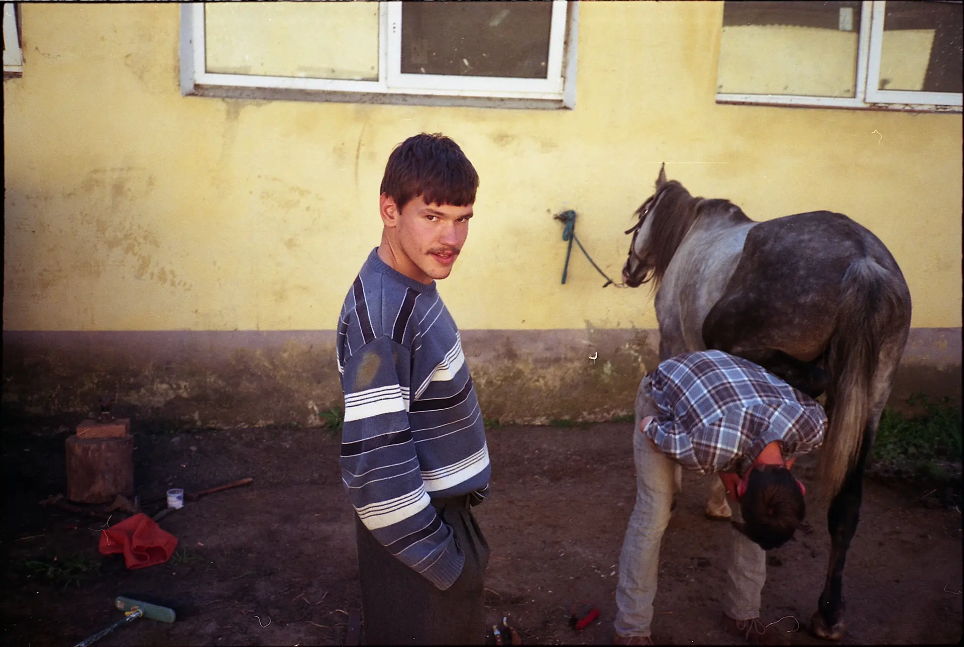 Men with a horse