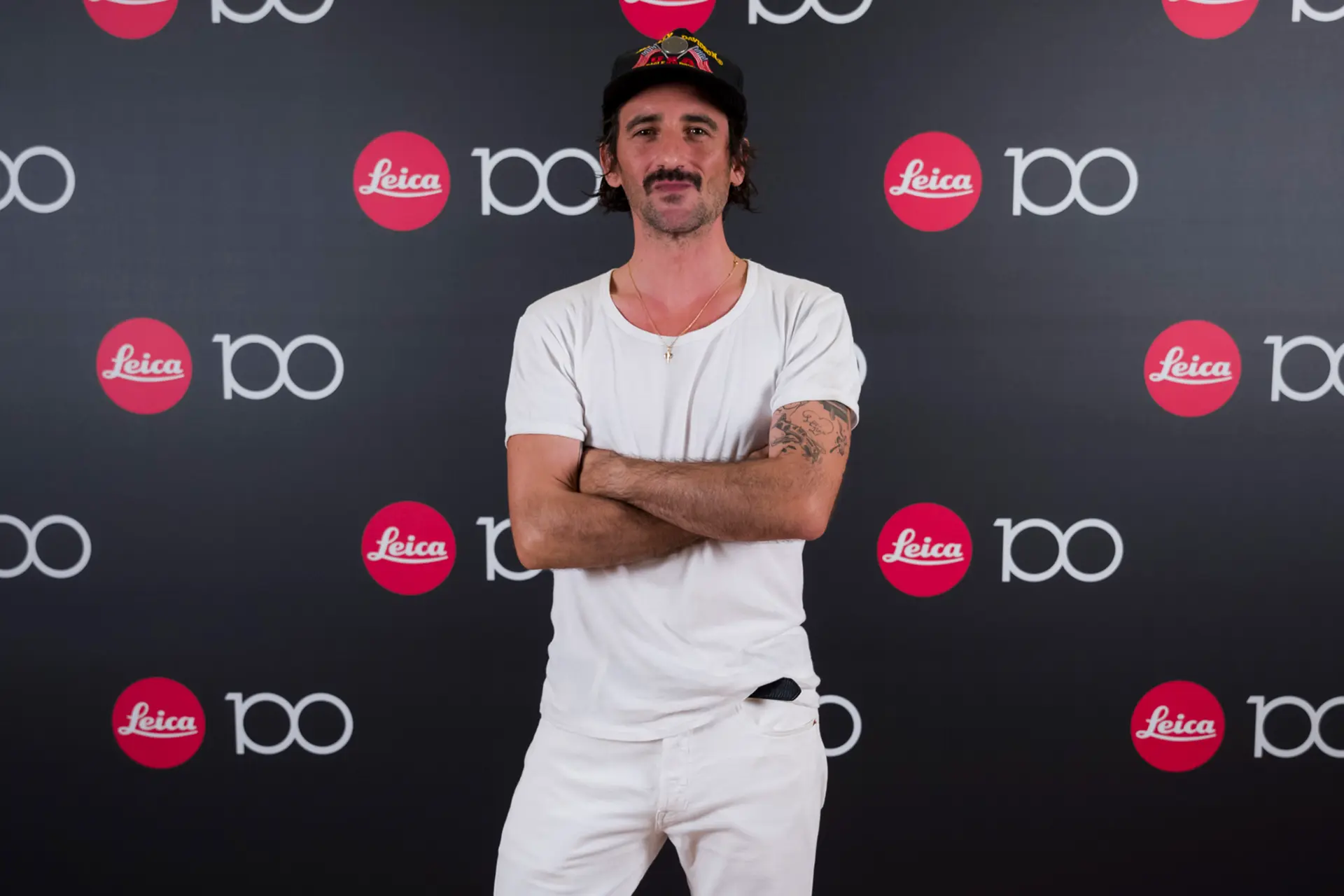 Century Celebration Madrid man infront a photowall