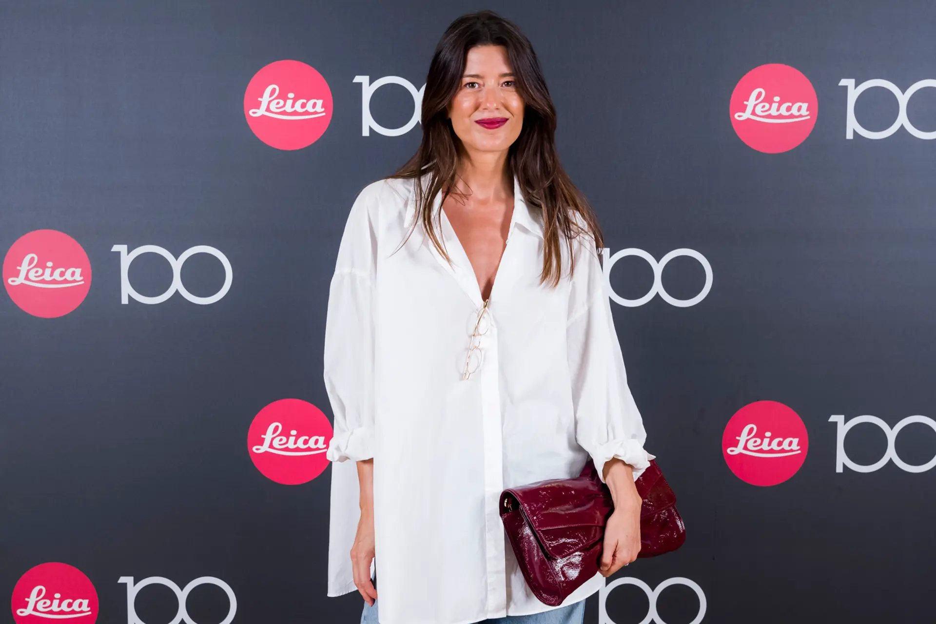 Century Celebration Madrid woman infront a photowall