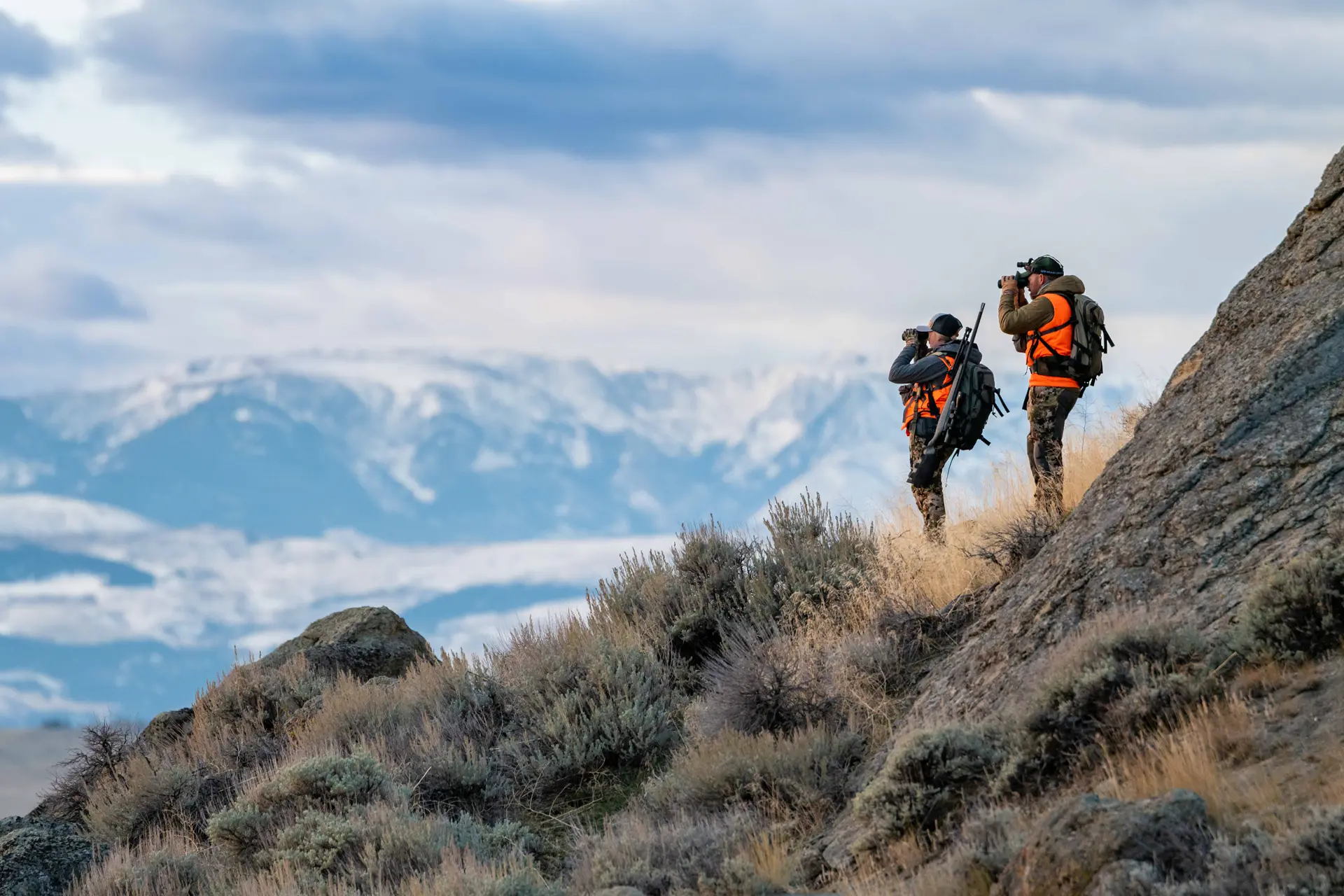 Two hunters are looking through their Leica Geovid Pro