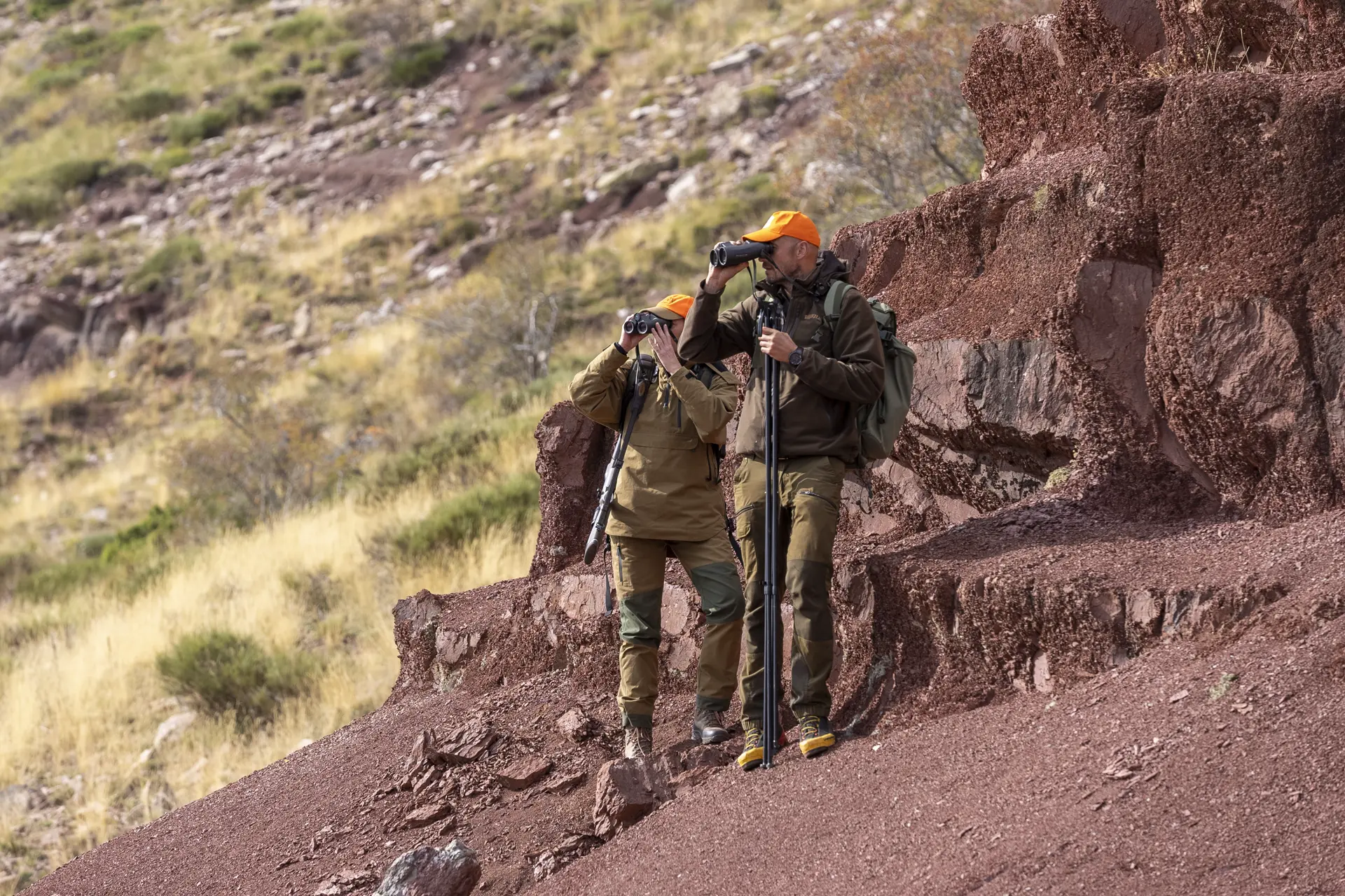 Two hunters looking through their Leica Geovid