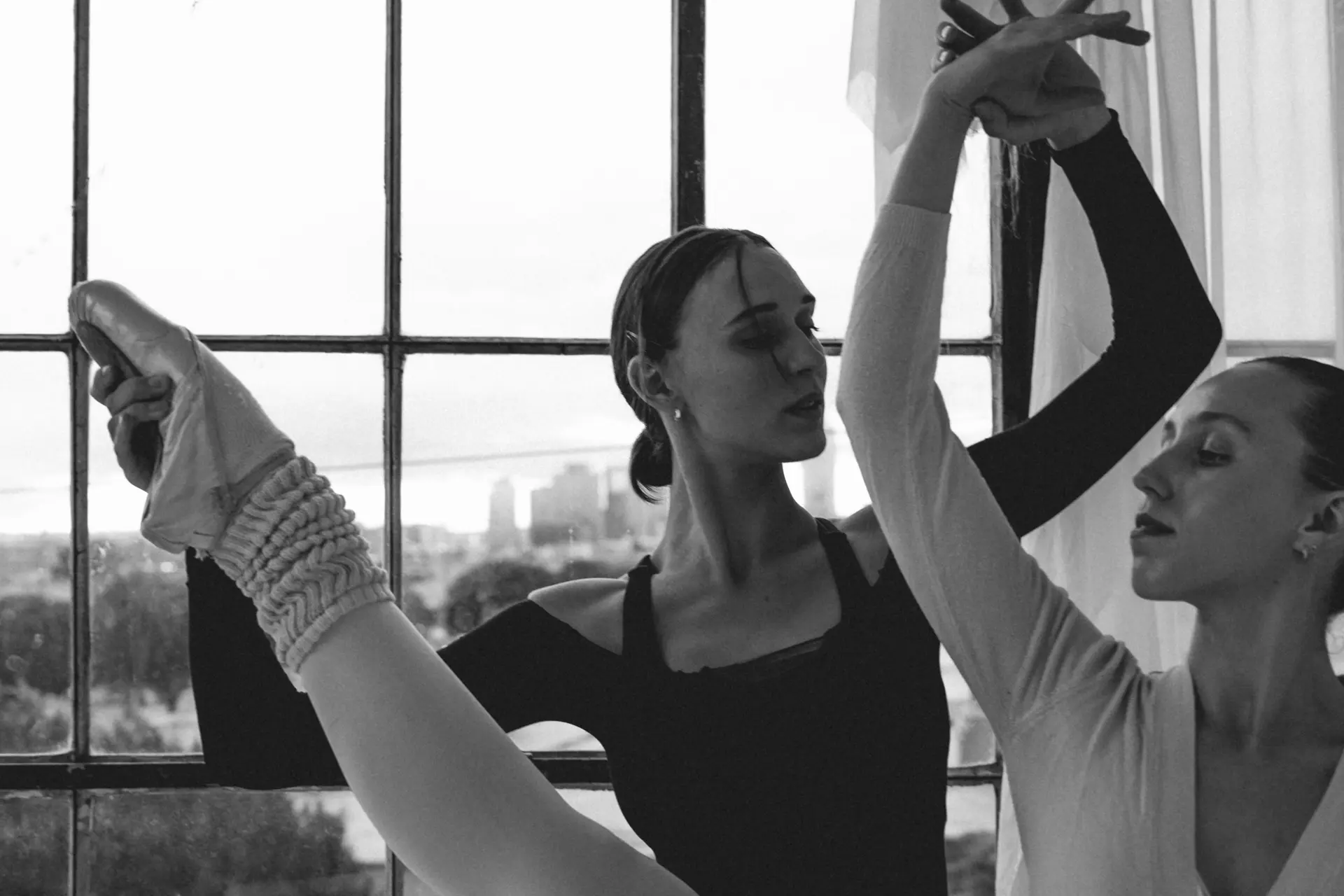 Black and white photograph of dancers during practice