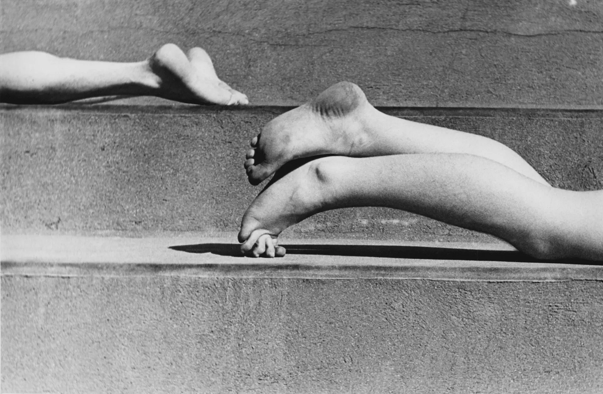 Two pair of Legs on a stair