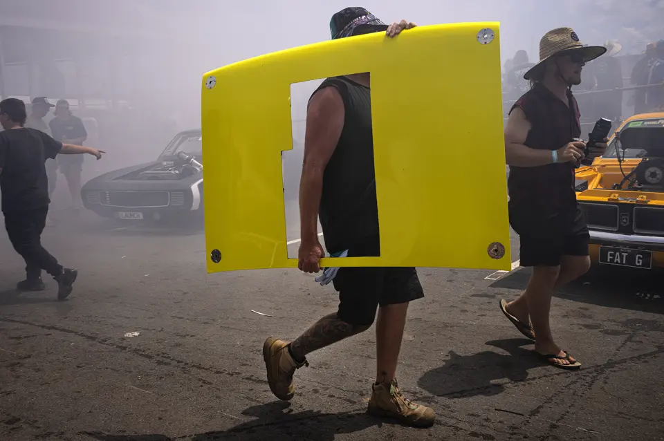 Person carrying a door