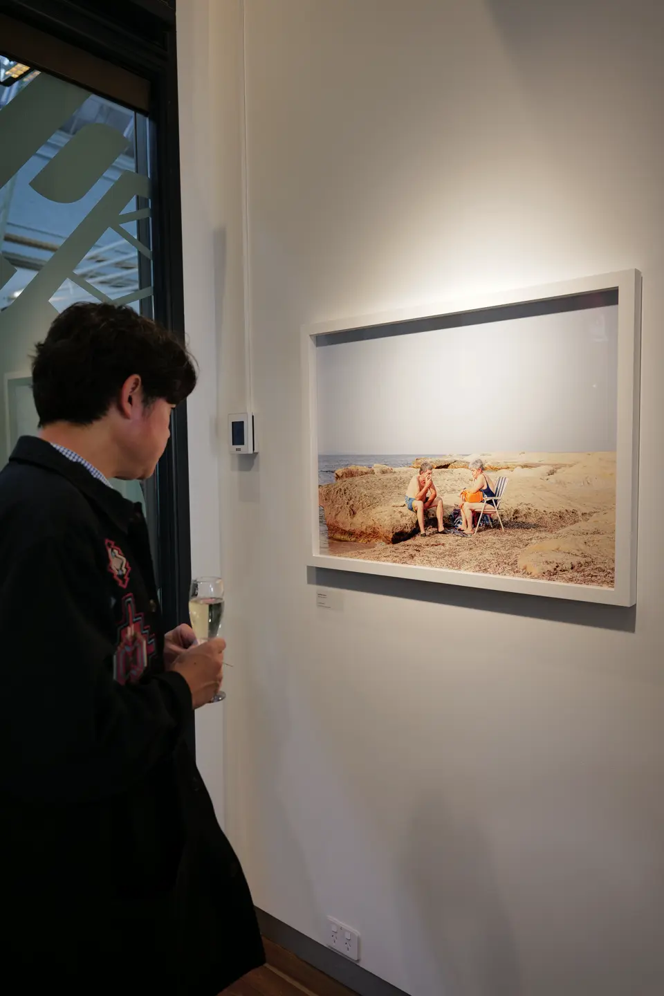 A customer looking at a photo