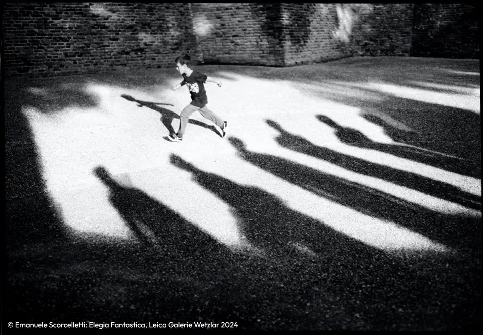 Boy runs on the street