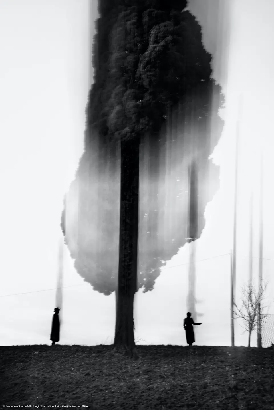 Disappearing scene in black and white with two people