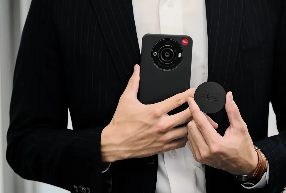 Man with a leitz phone 3