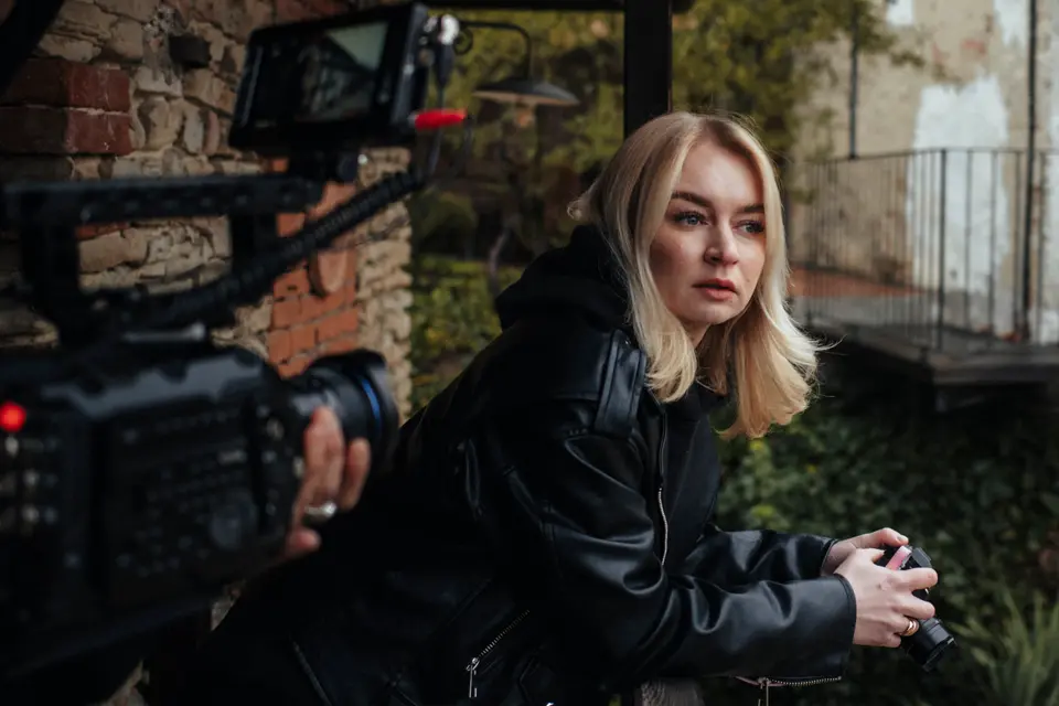 A woman is filmed