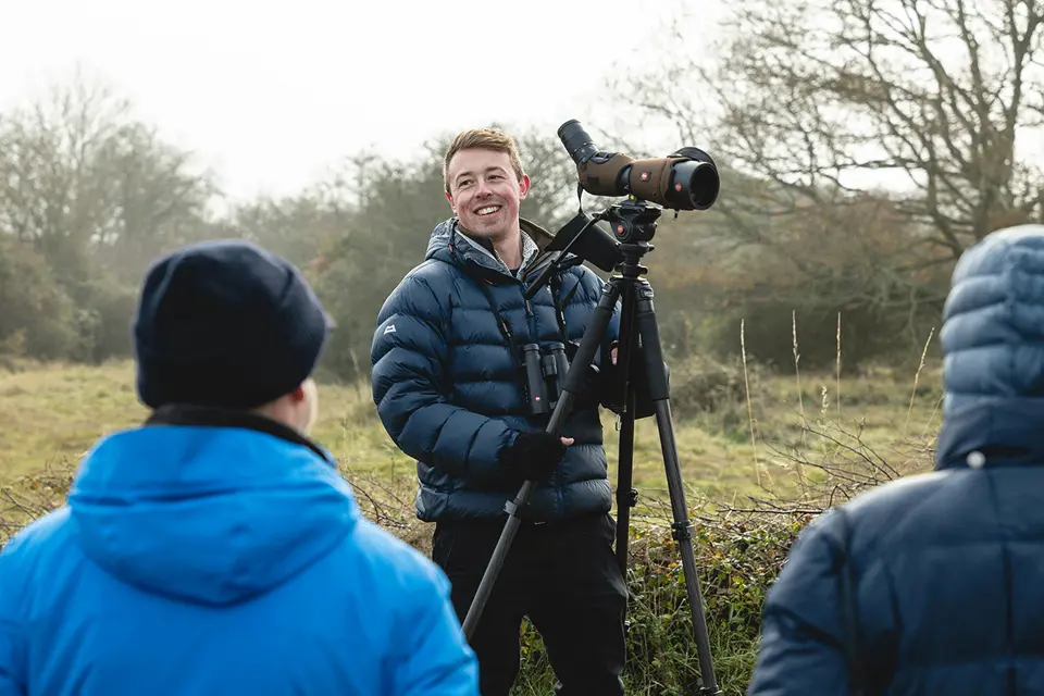 Harry Read presenting a Leica Scope in nature. 