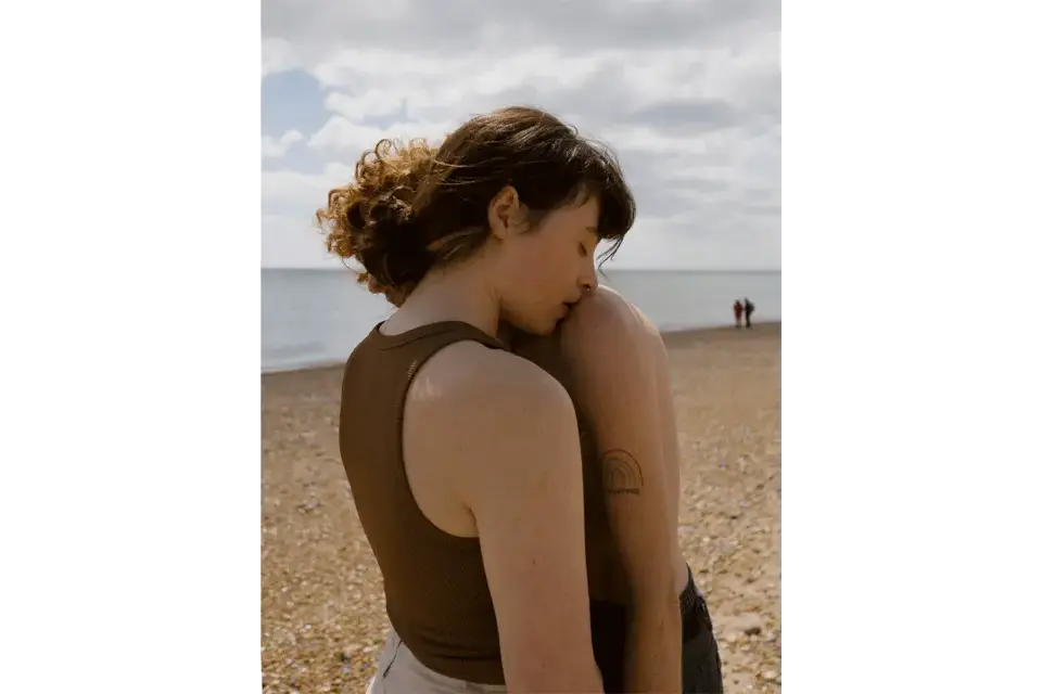 Intimate portrait of a couple at the beach front. 